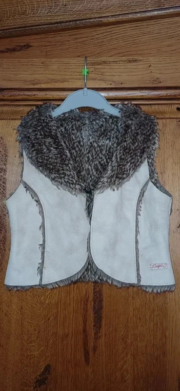 Veste sans manche fausse fourrure taille 4 ans